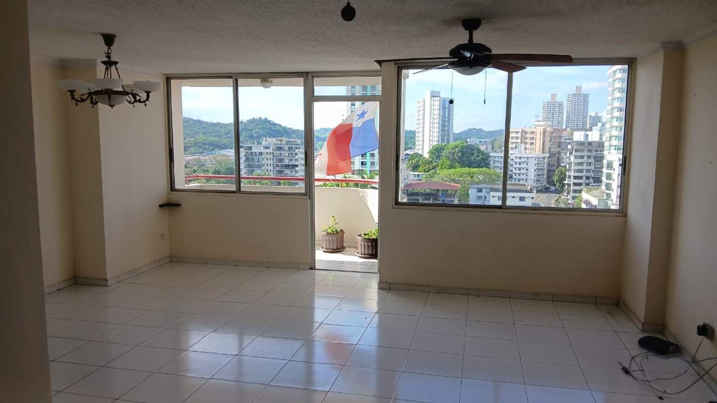 Living and dining area with balcony access, white tiles, ceiling fan PH Vista Hermosa Tower