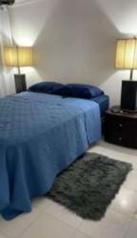 One bedroom apartment featuring double bed, ambient lighting, modern decor in PH Villa Natura Panama City