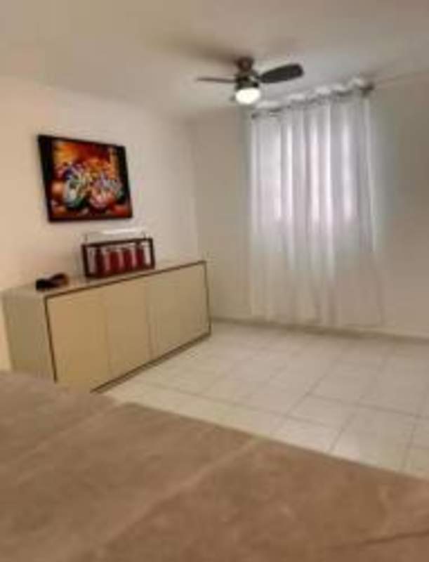 Compact kitchen with marble style counter, appliances, cabinetry at PH Villa Natura Rio Abajo