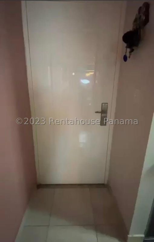 Open dining and living space with tile floors ceiling fans Mystic Tower Apartment Panama