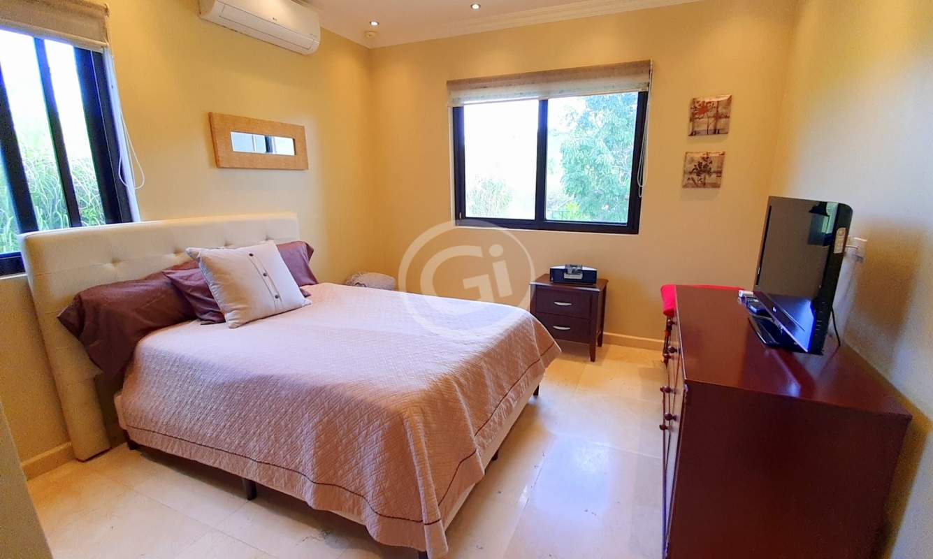 Elegant master bedroom balcony walk-in closet Embassy Club house Clayton Panama