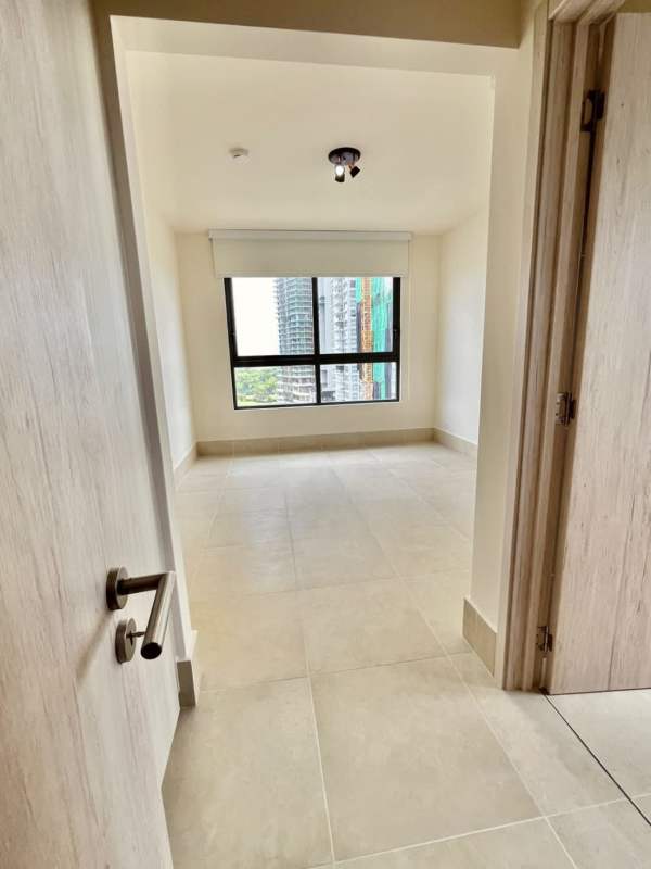 Minimalist bedroom with built-in closet, large window and AC at Ocean House Santa Maria Panama