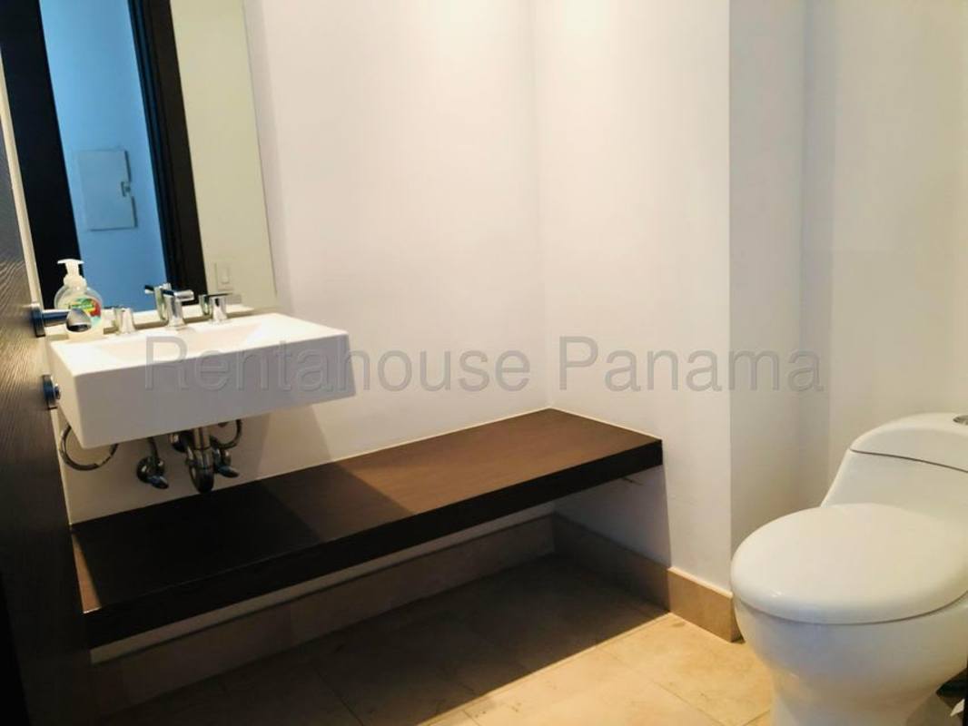 Bedroom with ocean view and built-in closet in luxury Trump Ocean Club Panama apartment