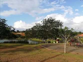 Community park with pond and playground in Villas del Lago Nuevo Emperador Panama