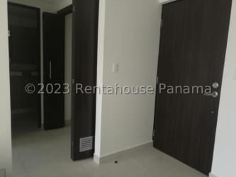 Bright living area with large windows and balcony PH Mosaic condo Panama
