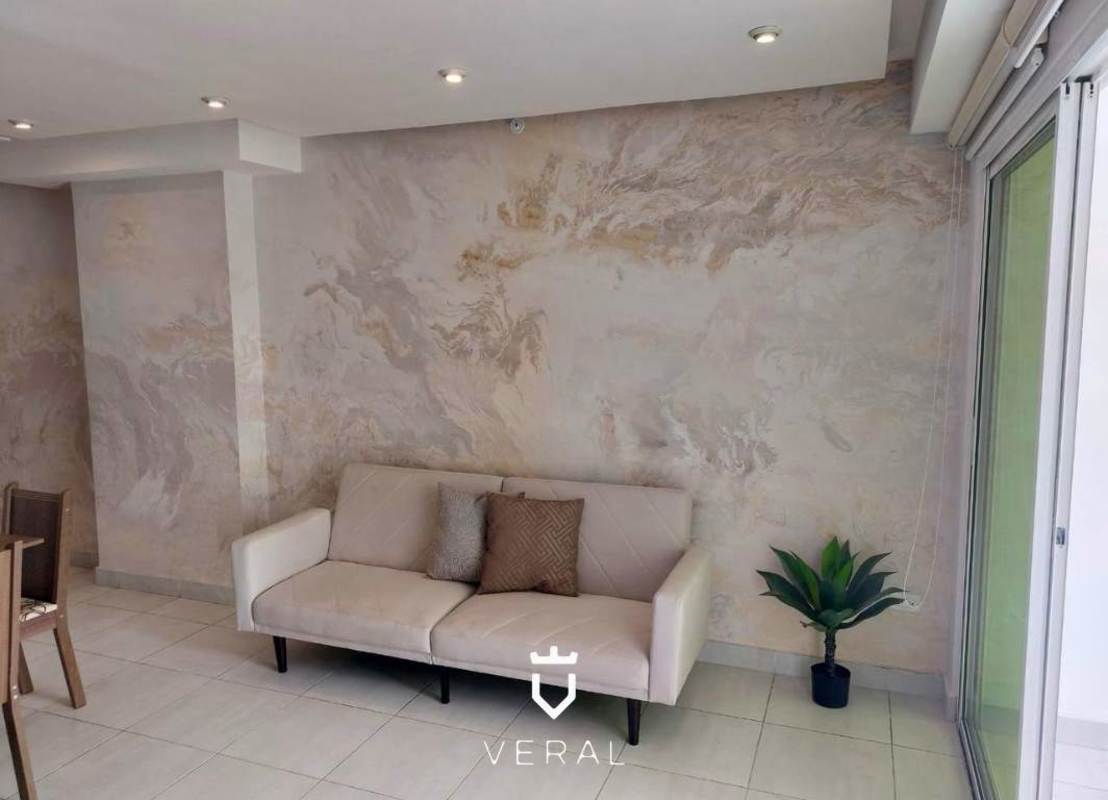 Rooftop adult and children swimming pools with panoramic city skyline at PH Metropolitan Park Panama