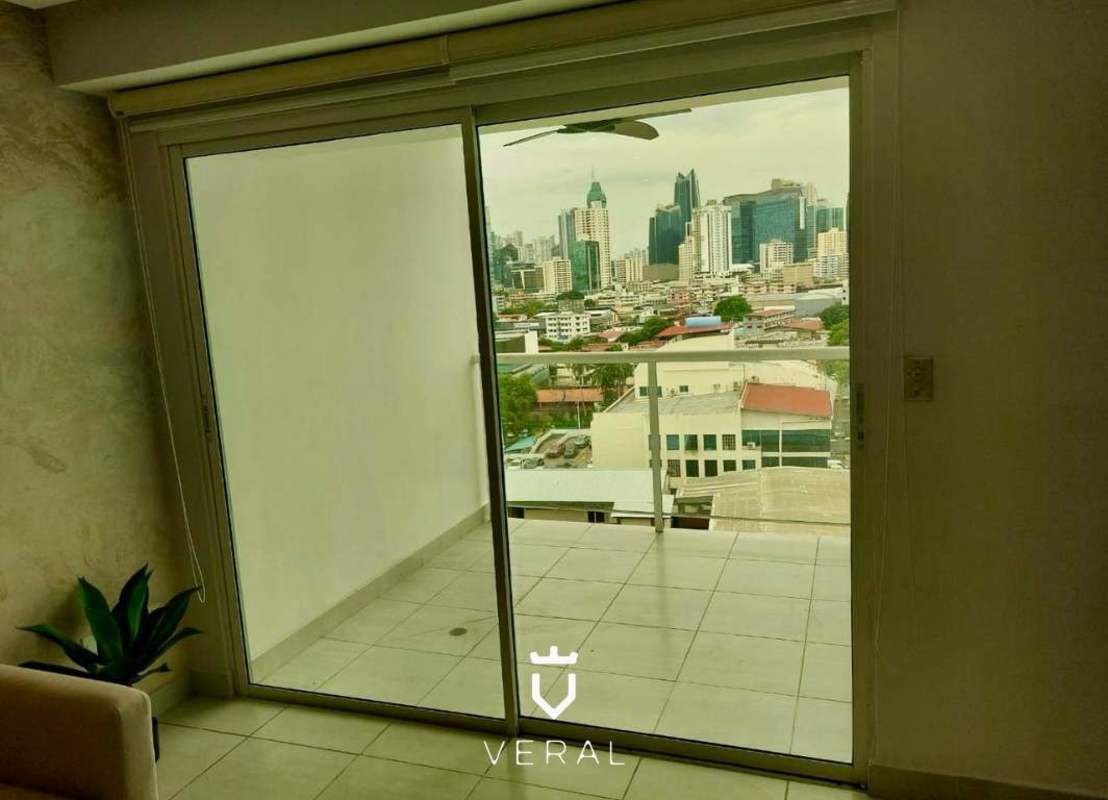 Modern open concept kitchen with granite counters in PH Metropolitan Park Panama City