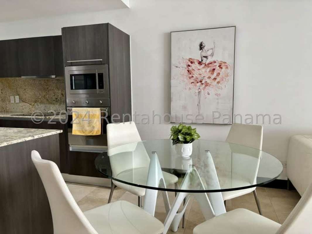 Upscale kitchen with granite counters and stainless appliances in Punta Pacifica apartment