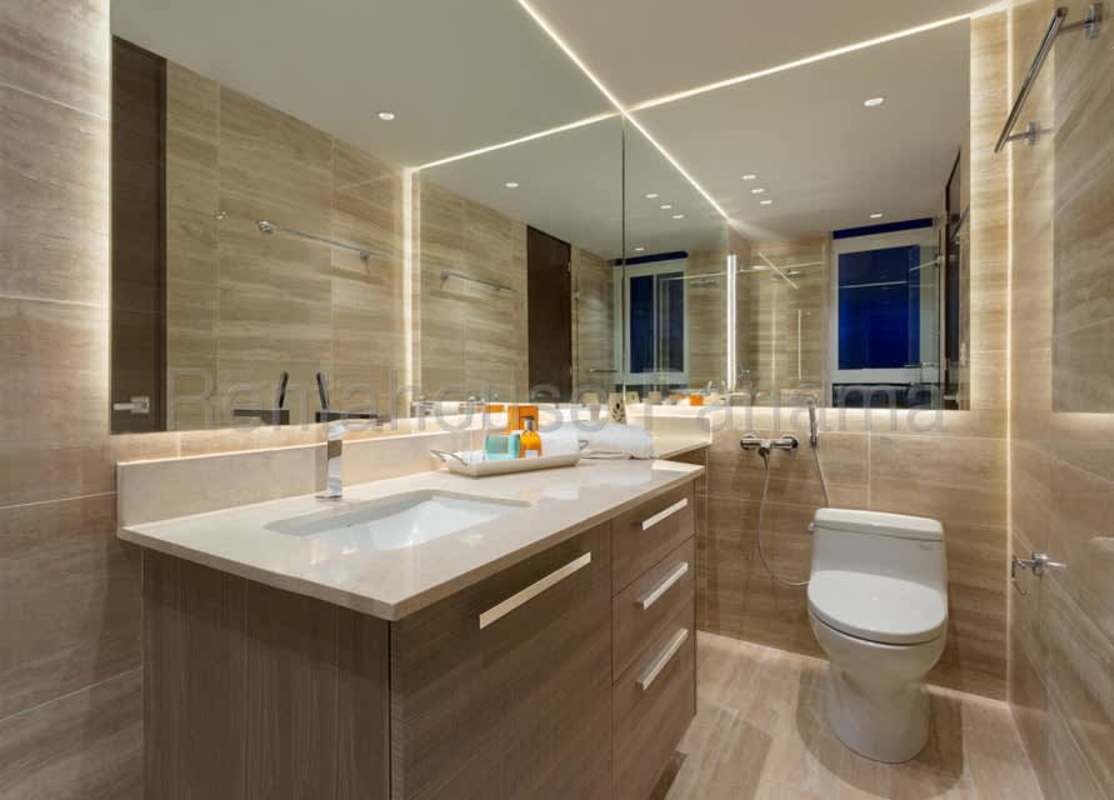 Contemporary bathroom with LED mirror, neutral tiles and vanity Costa del Este rental