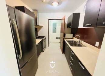 Outdoor swimming pool and clubhouse area at PH River Valley Residential Panama Pacifico