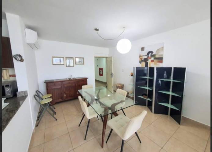 Modern bathroom with glass enclosure and granite counters at PH Van Gogh El Cangrejo