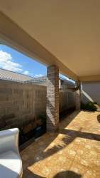 Covered patio with tile floor in backyard rental house Aguadulce Panama Joyas del Pacífico