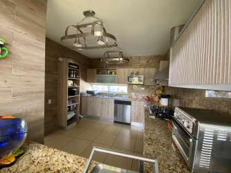 Bright bedroom with closet ensuite bath garden view Villas Decameron Rio Hato Panama