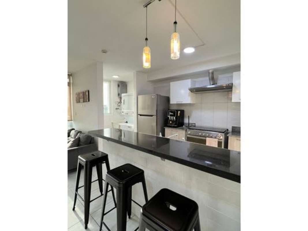 Bathroom with glass shower, modern fixtures at PH Metropolitan Park Vía España Panama
