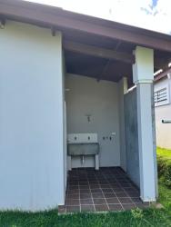 Covered utility patio with sink and side access in Brisas del Golf Arraiján house Panama