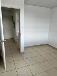 Empty bedroom with split AC, purple curtains, ceramic tile in Brisas del Golf Arraiján Panama
