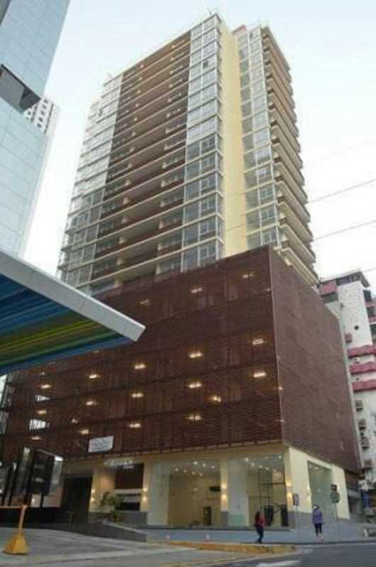 Exterior tall apartment building with glass balconies PH Quartier Atlapa San Francisco Panama