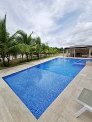 Outdoor kids playground swings slide shaded PH Madeira Panama Pacifico complex