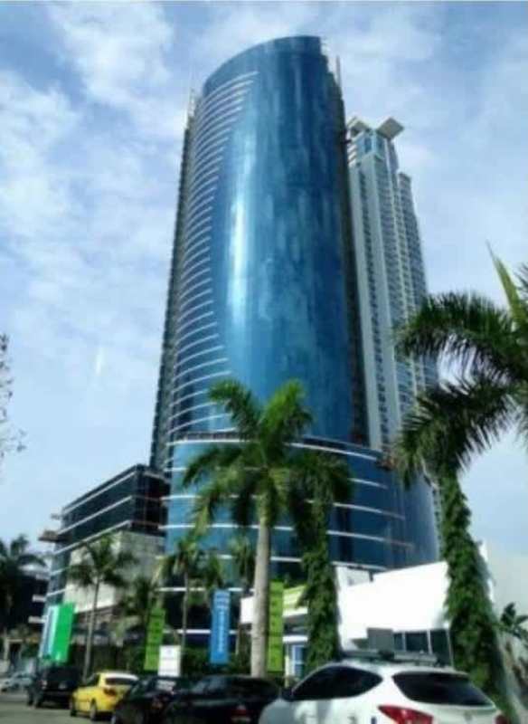 Tall glass skyscraper Financial Park Tower Costa del Este Panama exterior view