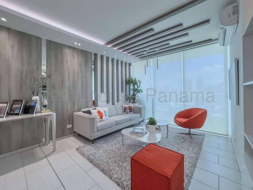 Modern living room with balcony access, large windows, city views PH The Towers Panama