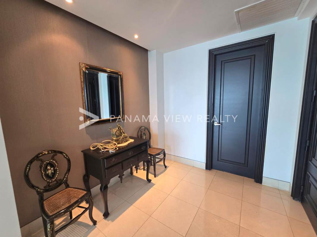 Modern bathroom with beige tile and stylish fixtures PH Ocean One Costa del Este Panama