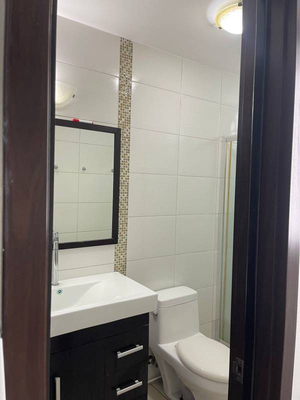 Contemporary bathroom with glass shower enclosure PH King Park Panama