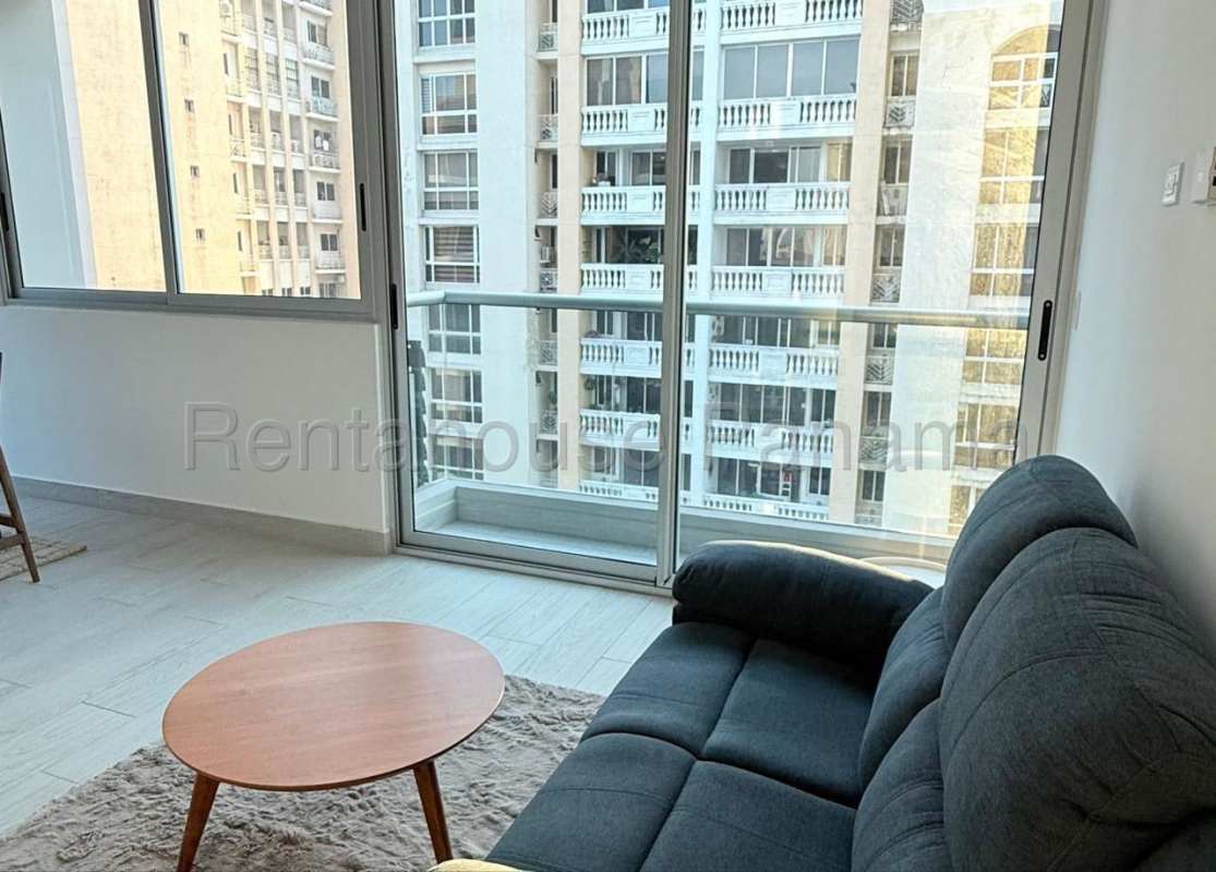 Modern open-plan kitchen with dining table and city views in PH Obarrio Sky Panama City