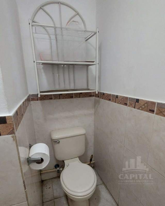 Bathroom with shower and tiles in affordable house in Villa Don Bosco Panama