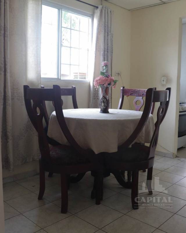 Main living room with tile floors in Villa Don Bosco house Panama
