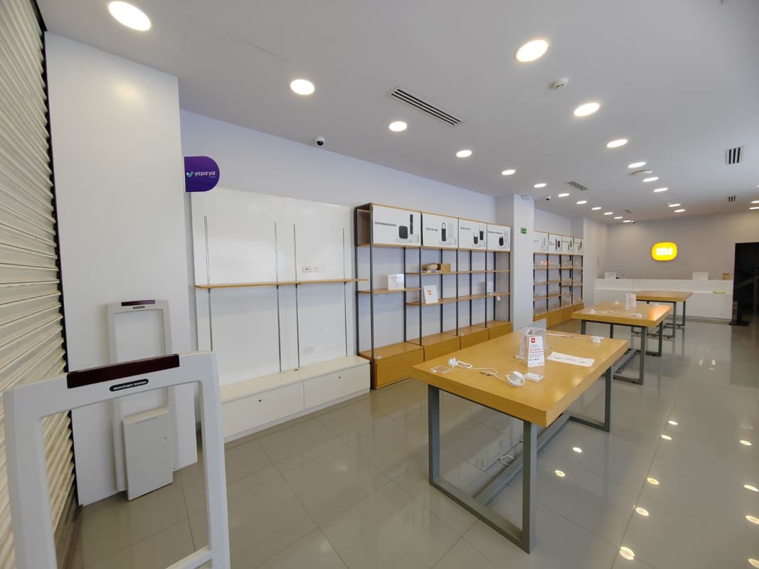 Upper mezzanine level retail space with railing inside Albrook Mall store Panama