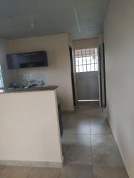 Open layout kitchen and dining with granite countertop in La Mitra La Chorrera house for rent