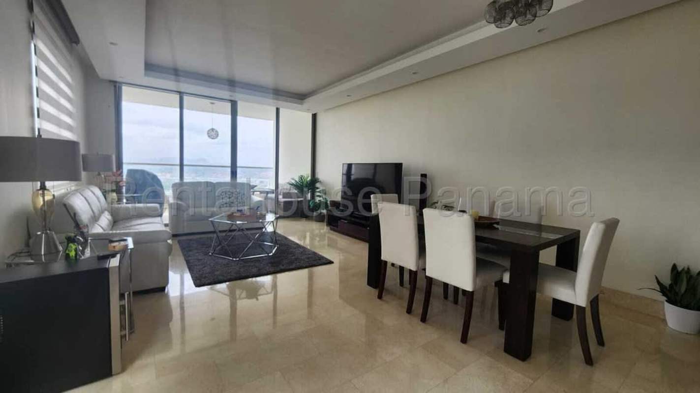 Open-plan furnished living dining space with marble floors, city and golf views in PH Santa María