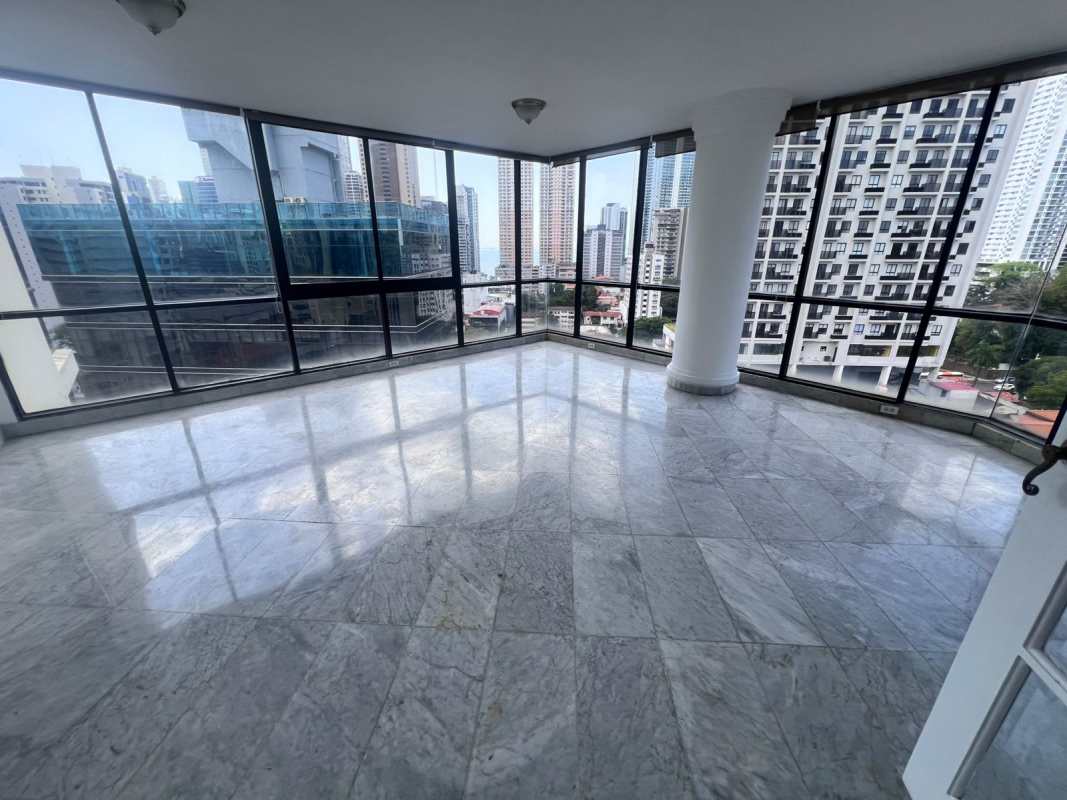 Elegant living space with marble floors, large windows, panoramic city skyline at PH Vista Tower Panama