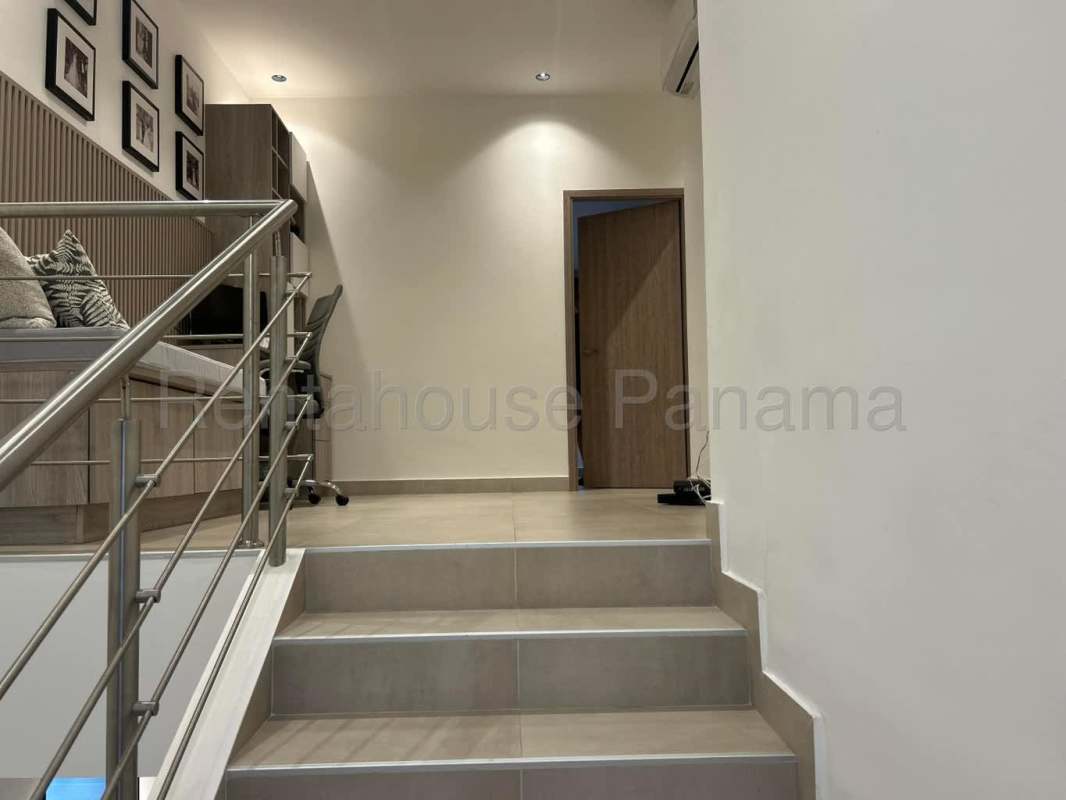 Bright master bedroom with large windows and modern finish in Costa Linda Panama