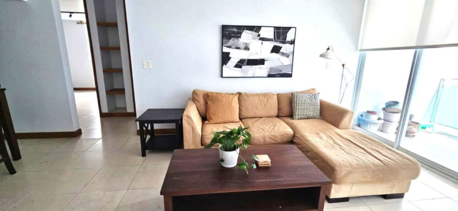 Open kitchen with granite counters and appliances in El Cangrejo Panama rental