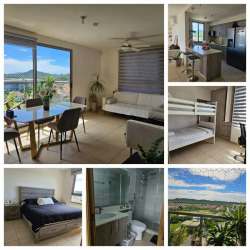 Children's bedroom with bunk beds, built-in closet, ceiling fan and natural light in Woodlands Panama Pacifico