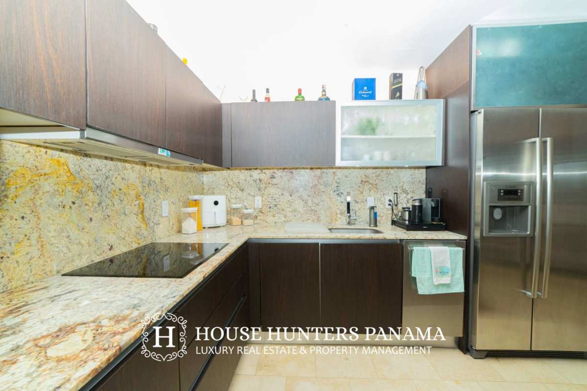 Elegant bedroom with ocean views and floor-to-ceiling windows in The Ocean Club Panama City