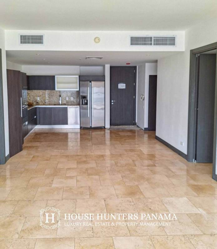 Modern bright living room with large windows ocean view marble floors The Ocean Club Punta Pacifica Panama