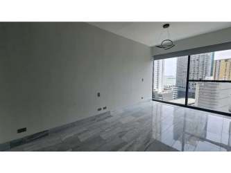 Open plan living-dining area with marble flooring and stunning city views at Nuovo Armani Bella Vista Panama City