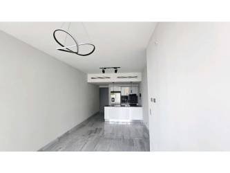 Minimalist hallway with white walls, marble tiles at PH Nuovo Armani Bella Vista Panama