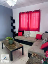 Air-conditioned bedroom with window and neutral tones in house for rent in Los Algarrobos