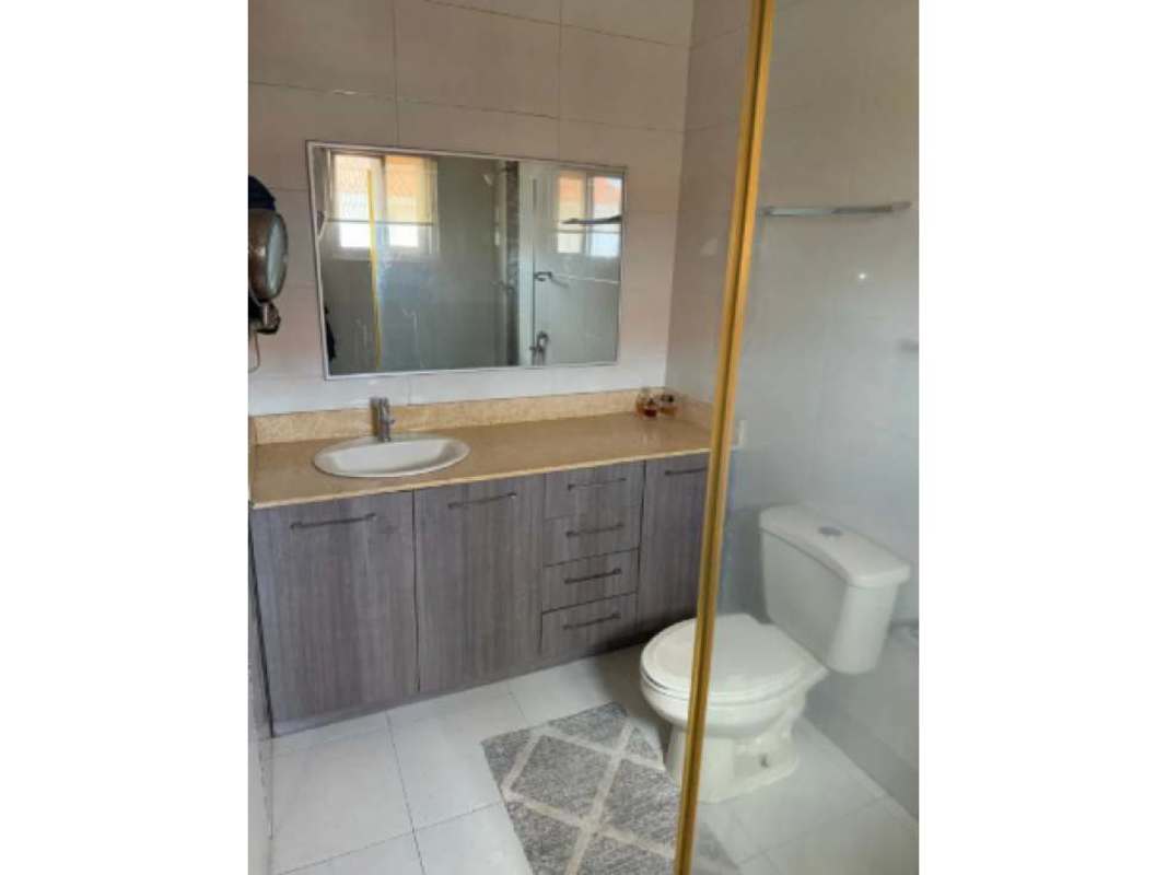 Entry with spacious hallway, modern stairs with railing in Quinta de Versalles Panama