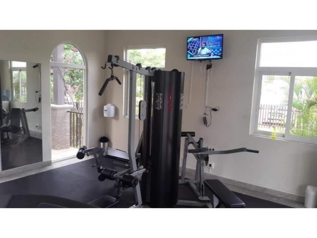 Outdoor tennis court shared by residents of Quinta de Versalles Panama