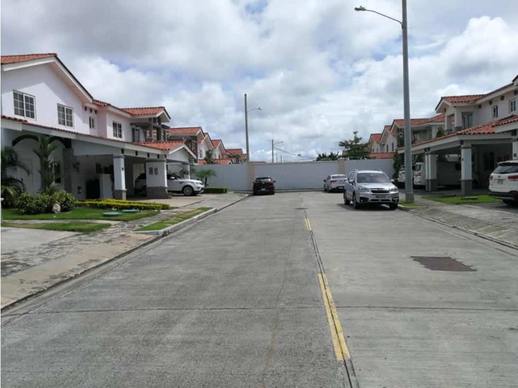 Spacious open plan living and dining room with large windows and tile floors Model Toledo Quinta de Versalles Panama