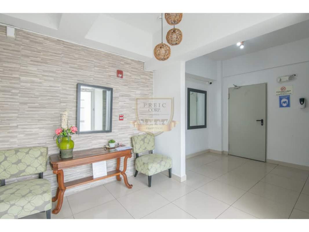 Bright kitchen with cabinets and window PH Residencial Ibiza Hato Pintado Panama