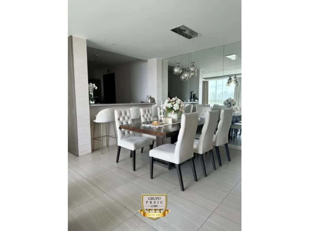 Spacious open living dining space with floor-to-ceiling windows and balcony PH Asia