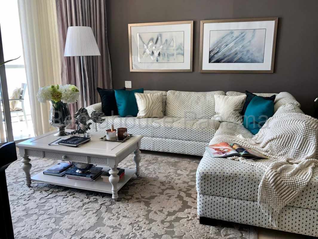 Contemporary living room with large windows and ocean skyline views PH Ocean Club Panama