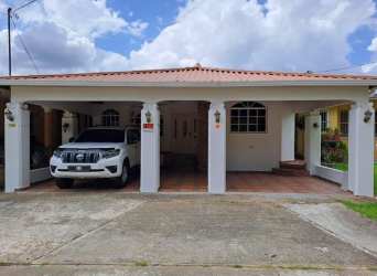 Covered patio with garden seating Hato Montaña residential house for sale Arraiján Panama