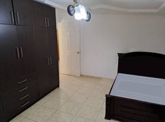 Living space with AC, window, white tiles Hato Montaña Arraiján Panama