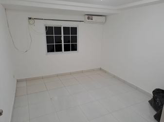 Small bathroom with glass shower enclosure and modern tile Hato Montaña house Panama
